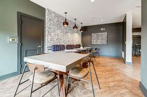 Denver apartment for rent - A dining room with a table and chairs.
