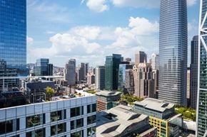 San Francisco apartment for rent - A cityscape with tall buildings and a clear sky.