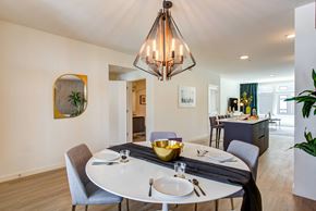 Glendale apartment for rent - A dining room with a round table set for two.