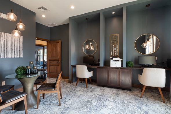Frisco apartment for rent - A modern living room with a grey carpet and a wooden cabinet.