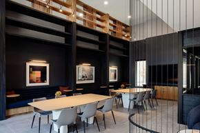 Alameda apartment for rent - A modern dining room with a long table and chairs.
