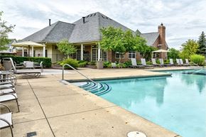 Ann Arbor apartment for rent - Pool with lounge chairs at Main Street apartments for rent in Ann Arbor, MI