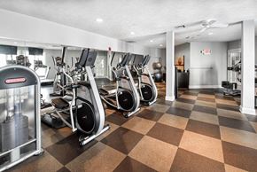 Westerville apartment for rent - A gym with a variety of exercise equipment including treadmills, stationary bikes, and elliptical machines.