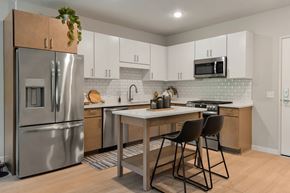 Cottage Grove apartment for rent - A kitchen with a table and chairs.