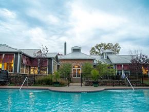 Memphis apartment for rent - A house with a pool in front of it.