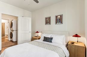 Madison apartment for rent - A bedroom with a large bed and two lamps.