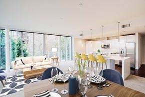 San Jose apartment for rent - A modern dining room with a table set for a meal.