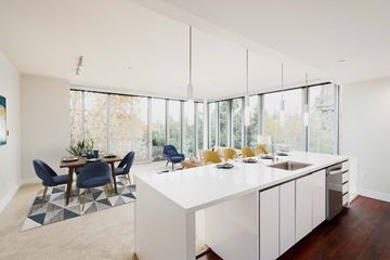 San Jose apartment for rent - A modern kitchen with a dining table and chairs.