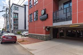 Richmond apartment for rent - A red building with a sign that says Olde Stone.