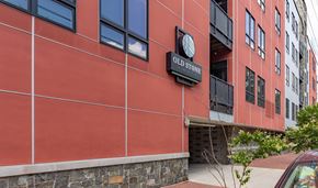 Richmond apartment for rent - A red building with a sign that says Old Stone.