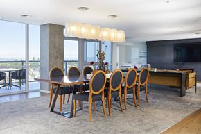Seattle apartment for rent - A dining room with a large table and chairs.