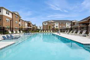 Brandywine apartment for rent - Expansive swimming pool in front of apartment buildings at Brandywine Green, Brandywine, Maryland