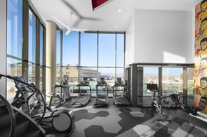 Phoenix apartment for rent - A gym with treadmills and exercise bikes.