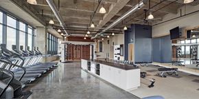 Raleigh apartment for rent - A gym with treadmills, weights and exercise equipment.