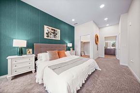 Los Angeles apartment for rent - A bedroom with a large bed and a white dresser.