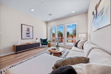 Los Angeles apartment for rent - A living room with a white couch and a coffee table.