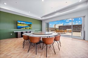 Los Angeles apartment for rent - A conference room with a large table and chairs.