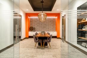 Alexandria apartment for rent - A modern dining room with a wooden table and chairs.