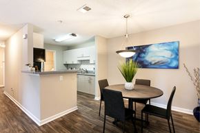Sandy Springs apartment for rent - Furnished dining area with table and chairs at Aqua Sandy Springs apartments.