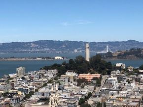 San Francisco apartment for rent - A cityscape with a prominent tower in the distance.