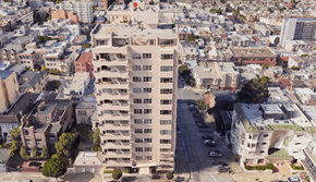 San Francisco apartment for rent - A tall building with a flat roof is surrounded by other buildings.