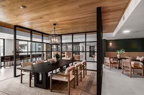 Austin apartment for rent - A modern dining room with a large table and chairs.