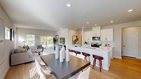 Fountain Inn apartment for rent - A modern kitchen with a dining table and chairs.