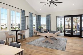 Folsom apartment for rent - A room with a pool table and a ceiling fan.