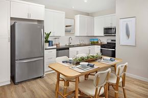 Folsom apartment for rent - A modern kitchen with a dining table and chairs.