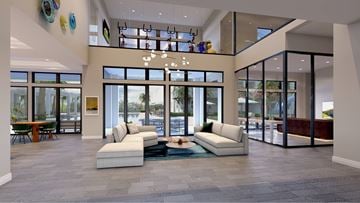 Pembroke Pines apartment for rent - A modern living room with a large sectional sofa and a coffee table.