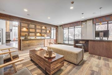 Salt Lake City apartment for rent - A living room with a wooden coffee table and a couch.