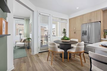 Mountain House apartment for rent - A modern kitchen with a dining table and chairs.