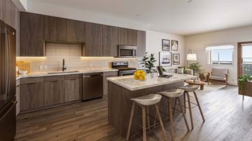 Murrieta apartment for rent - A modern kitchen with wooden cabinets and a central island.