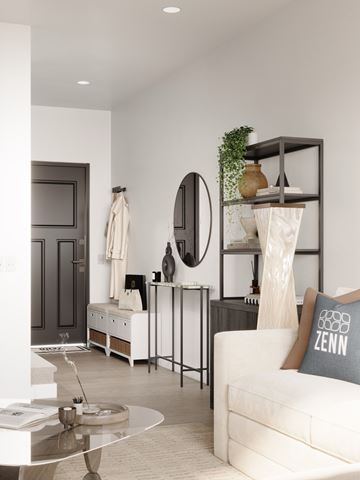 Phoenix apartment for rent - A modern living room with a white sofa and a glass coffee table.