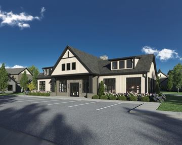 Noblesville apartment for rent - A large building with a parking lot in front.