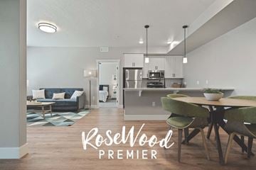Boise apartment for rent - A modern living room with a dining table and chairs.
