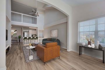 San Antonio apartment for rent - A living room with a brown sofa and a white coffee table.