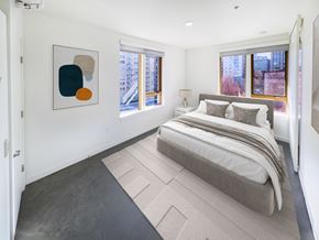 Portland apartment for rent - Bedroom with a bed and two windows