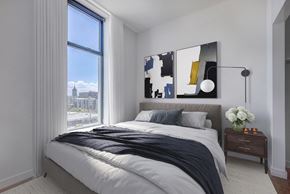 Salt Lake City apartment for rent - Bedroom with city view, queen sized bed, and decor