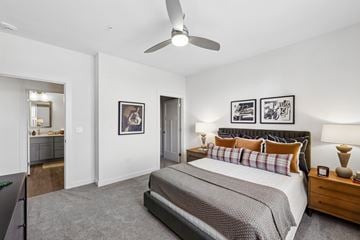 Brentwood apartment for rent - A bedroom with a large bed and a ceiling fan.