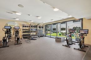 Richmond apartment for rent - A spacious gym with a variety of exercise equipment.