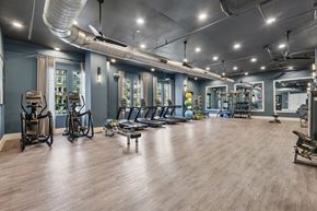 Charlotte apartment for rent - A spacious gym with a variety of equipment.