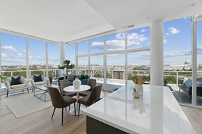 Washington apartment for rent - A modern dining room with a view of the city.