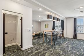 Williamsburg apartment for rent - a dining room with a table and chairs and a doorway
