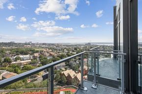 Alexandria apartment for rent - a balcony with a view of a city and a pool
