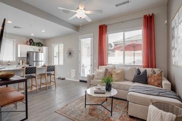 Peoria apartment for rent - a living room with a couch and a table