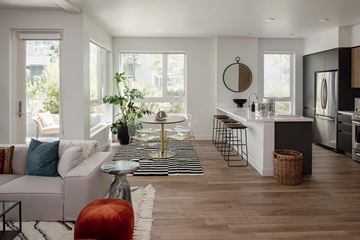 Los Angeles apartment for rent - a living room with a couch and a table and a kitchen