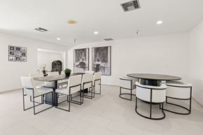 Mountain View apartment for rent - A white dining room with a table and chairs.