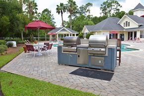 Gainesville apartment for rent - Exterior Pool Deck BBQ Grills at Magnolia Place Apartment, Gainesville
