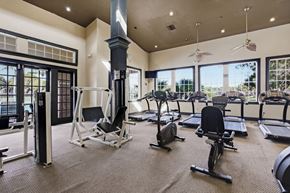 Miramar apartment for rent - A gym with a variety of equipment including treadmills, weights, and a rowing machine.